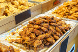 Fototapeta Paryż - Succulent Honey-Glazed Chicken Wings