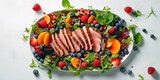 Fototapeta Las - minimalistic design Gourmet salad with smoked duck fillet, fruit and berries, arugula and lettuce