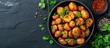 © vxnaghiyev - Close up view of bombay potatoes Pan fried little baby potatoes with jeera seeds and coriander in pan Popular indian dish Top view flat lay. with copy space image. Place for adding text or design