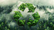 overhead perspective of recycling emblem superimposed on dense woodland to symbolize eco friendliness