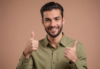 Wall Mural - A man with a beard in an olive shirt giving two thumbs up, signifying strong approval and positivity.