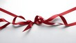 © Lied - red ribbon with bow on white background, free space