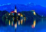 Fototapeta Morze - Bled, Slovenia. Sunset view of Bled Lake, island and church with Julian Alps in background