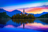 Fototapeta Morze - Bled, Slovenia. Morning view of Bled Lake, island and church with Julian Alps in background