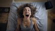 Woman screaming in bed