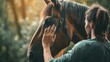 Person caressing a horse in the sunlight, nature setting