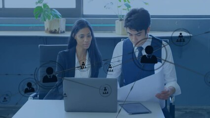 Canvas Print - Animation of network of conncetions over diverse colleagues discussing work in office