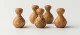 Fototapeta  - Three vintage wooden bowling pins set on a plain white background