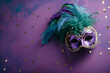 Carnival mask on a violet background, suitable for design with copy space, Mardi Gras celebration.