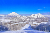 Fototapeta Dziecięca - 真冬の快晴の日本北海道のルスツスキー場、ゲレンデ内から見える羊蹄山とルスツスキーリゾートの景観
