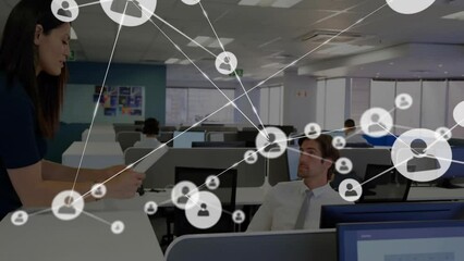 Wall Mural - Animation of network of connections with people icons over diverse business people in office