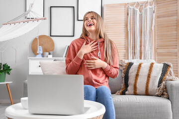 Sticker - Teenage girl with laptop video chatting at home