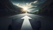 An asphalt road stretches into the distance with a painted white arrow pointing forward, symbolizing motivation
