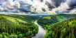 A curvy river in Thuringia, Germany, surrounded by forests