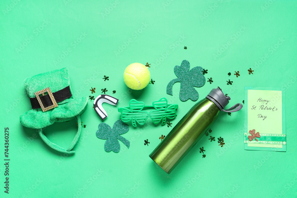 Sports equipment and decorations for St. Patrick's Day celebration on green background