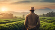 © Sadushi - Closeup of man wearing hat walking through tea plantations in the mountains at sunset. Nature beauty, leisure time, activity, sport, travel, relaxation concept. World Tourism Day, September 27