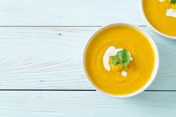 Canvas Print - pumpkin soup in white bowl