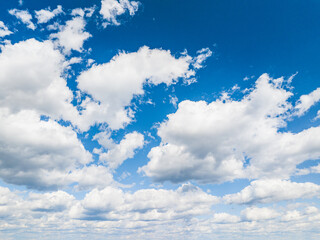 blue sky with layered clouds