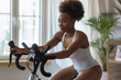 © Centric  - Active Lifestyle: Beautiful Women Staying Fit with Home Gym Cycling and Treadmill Sessions