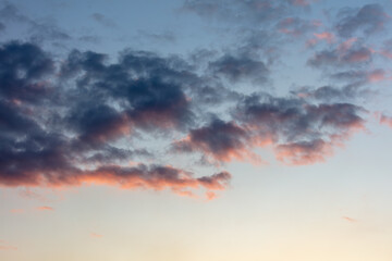 Wall Mural - Beautiful clouds at sunset as a background