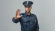 © Keitma - Man dressed as a police officer doing a stop gesture with his hand