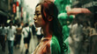 A conceptual image of a woman's profile with a double exposure effect, showing her overlaid on a busy urban street scene.
