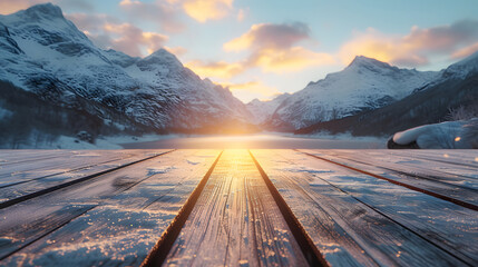 Wall Mural - A wooden floor looks out over a stunning mountain range at sunset.