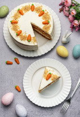 Wall Mural - Homemade Easter carrot cake made with walnuts, iced with cream cheese. Sweet dessert.