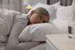 © New Africa - Menopause, sleep problems. Woman suffering from insomnia in bed indoors