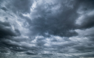 Wall Mural - dark sky with stormy clouds. dramatic sky rain,dark clouds before a thunder-storm.