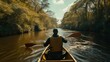 © Aliaksandra - Kayaking down a river with ample copy space for text, outdoor adventure and recreation concept