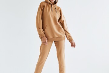 Canvas Print - Beige Hoodie Outfit for Young Adults. A Cozy and Casual Style for Street Fashion