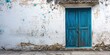 Blue Wooden Door: A Charming Entrance to Cyclade Village