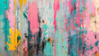 A weathered wall adorned with vibrant and chaotic paint strokes, graffiti, and colorful drips creating a lively abstract background