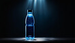 transparent plastic water bottle with backlight isolated on black background. pure drinking water in plastic bottle for advertisement and branding. package or packaging concept. 