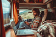 © Andrii  - Handsome Model Showcasing Mobile Work Ethos in RV