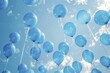 Blue balloons released into the sky, symbolic gesture, birthday wishes ascending.