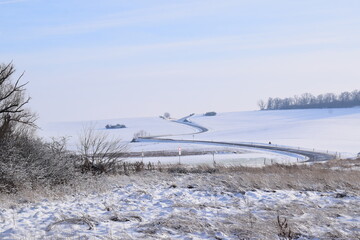 Sticker - curvy country road in snow covered land