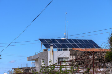 solar panels on the roof of a house in the village 2