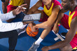 © Wavebreak Media - African American men review basketball strategy on a digital tablet