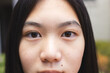 © Wavebreak Media - Close-up of a teenage Asian girl's face