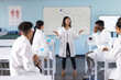 © Wavebreak Media - Young biracial woman teaches in a high school laboratory