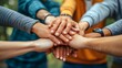 © Muzikitooo - A group of people hands together, teamwork.