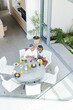 © Wavebreak Media - Senior biracial couple enjoys breakfast in a modern home setting