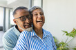 © Wavebreak Media - Senior biracial couple shares a joyful moment, with copy space