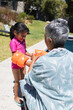 © Wavebreak Media - Biracial girl prepares for a swim