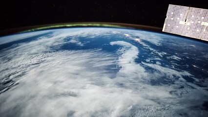 Wall Mural - flying over planet earth. beautiful clouds and atmosphere of earth. view from international space st
