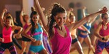 Woman in a cardio fitness dance class - aerobic workout with music for fun and fitness