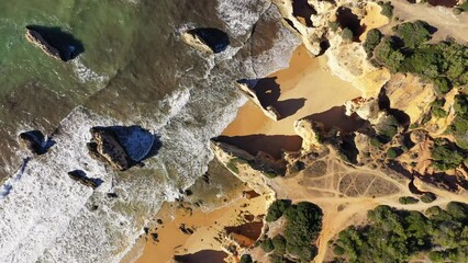 Wall Mural - The imposing rocky coastline of the Algarve towards Albufeira , Europe, Portugal, Algarve in summer on a sunny day.