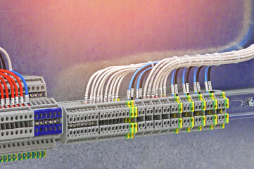 Canvas Print - Electrical pass-through terminals for connecting copper mounting wires in an electrical distribution cabinet.